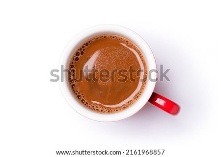Hot chocolate cocoa drink in red ceramic cup isolated on white background. Top view. Flat lay. Clipping path.