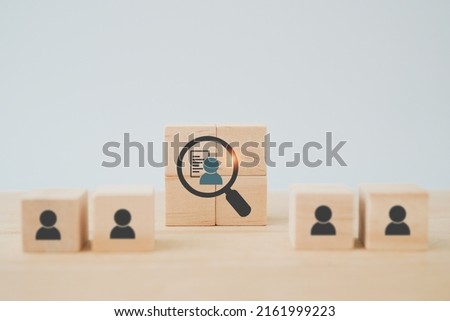 wooden cube blocks with buyer information in magnifying glass  ,buyer persona and target customer concept, Customer psychology profile or characteristics, Marketing analysis for business plan