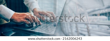 Businessman working stock traders making analysis of digital market and investment, technical chart red and green, hands using laptop for stock trading, Banner cover design.