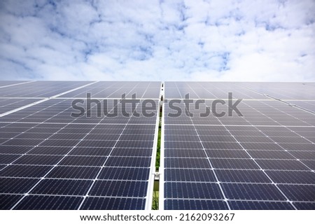 Cool plan Solar panels are used to produce clean electricity against the sky. In green technologies and renewable energy ideas