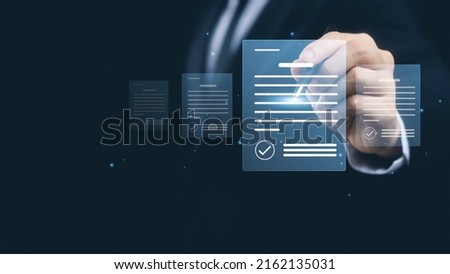 Electronic signature concept, business people sign electronic documents on digital documents, paperless office, future business contract signing. Royalty-Free Stock Photo #2162135031