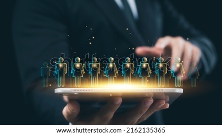 executive holding a tablet Virtual human icon, efficient organizational structure, human resource management. Royalty-Free Stock Photo #2162135365
