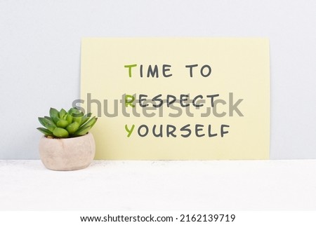 The words time to respect yourself are standing on paper, responsibility and development, motivation concept, cactus plant beside the message  Royalty-Free Stock Photo #2162139719