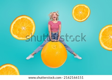 Creative illustration of person jumping over orange fruit have fun isolated on teal turquoise color background