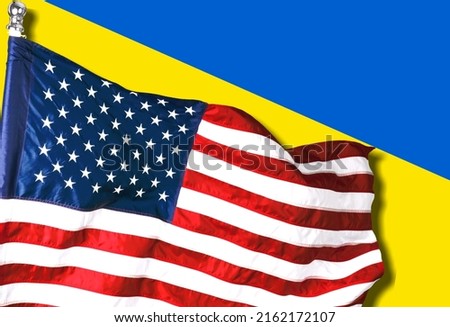 US flag together with Ukrainian flag in a single picture,  blending one into the other.