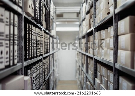 archive boxes shelf folders documents data Royalty-Free Stock Photo #2162201665