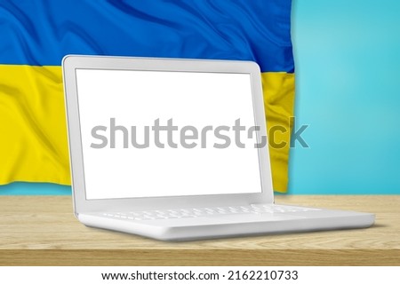 Laptop on Ukraine flag background