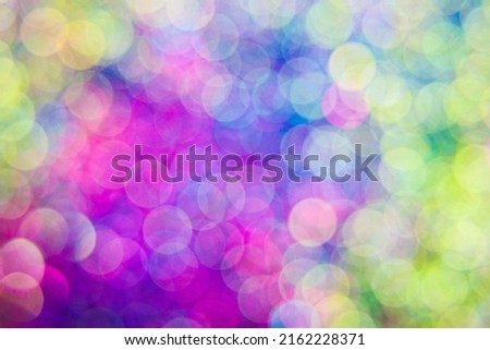 blurred Multi colored Background texture with nice bokeh. Luxurious abstract loop background, Trendy Iridescent Background Design. turquoise, orange, yellow,