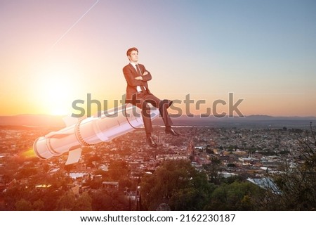 Businessman siting on a rocket on city background. Startup concept.