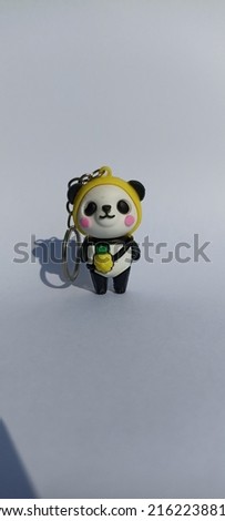 Doll character key chain, made of colorful rubber material, harmless.