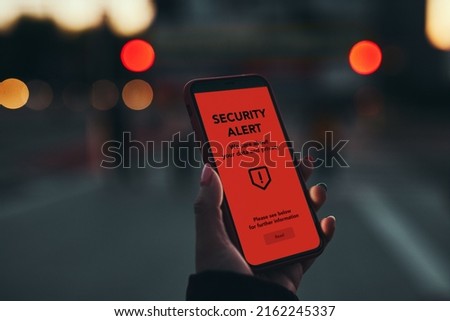 Security alert on smartphone screen. Antivirus warning. Private data protection system notification. Important security issue. Concept of cyber crime, hacking password and bank accounts Royalty-Free Stock Photo #2162245337