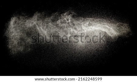Sprayed water. Splashes and drops of water isolated on black background. Royalty-Free Stock Photo #2162248599