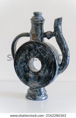   Ceramics, a ceramic product made with hands, made on a potter's wheel, a jug, a mug, clay.
