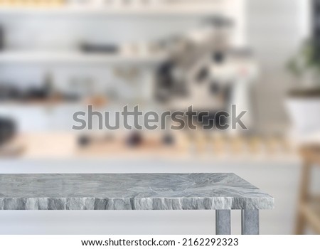 Empty stone table, coffee shop background
