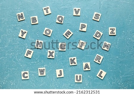 Different letters on grunge background. Alphabet concept