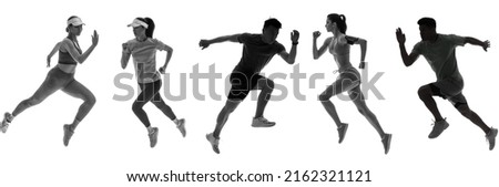 Silhouettes of running sporty people isolated on white
