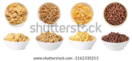 Set of bowls with different tasty breakfast cereals isolated on white Royalty-Free Stock Photo #2162330213
