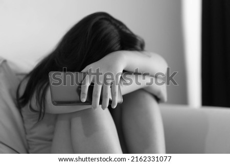 Cyberbullying Low self esteem.kid preteen, teenager girl feeling sad and crying with bad comments and hate speech on her social media.Mental health.Bully, Tween anxiety health, Social media harassment Royalty-Free Stock Photo #2162331077