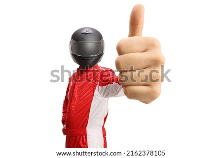 Racer with a helmet showing thumbs up in front of camera isolated on white background Royalty-Free Stock Photo #2162378105