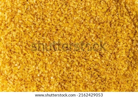 Groats Bulgur on a white background. Healthy food. Background. Photo Royalty-Free Stock Photo #2162429053