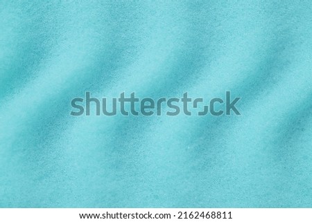 Blue sponge texture closeup view.