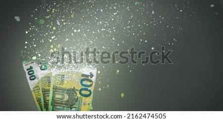 100 euro bills vanish into thin air Royalty-Free Stock Photo #2162474505