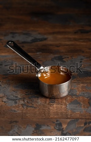 Cheese sauce, mustard, sour cream, tomato, sweet and sour sauce on a wooden background