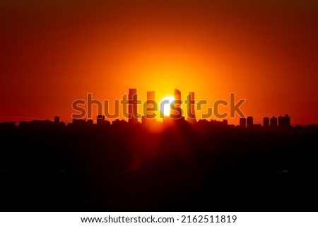 Madrid, Spain financial district skyline Silhouette at sunset