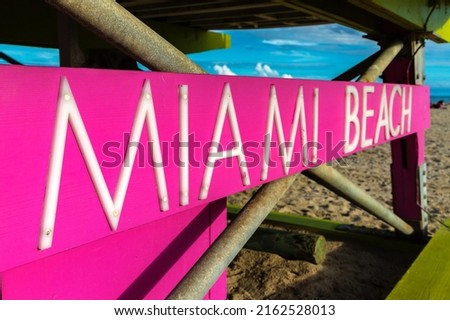 Close-up of Miami Beach sign on Lifeguard tower in South beach, Miami Beach in a sunny day, Florida
