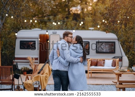 couple in love living in trailer on camping and have fun and happy