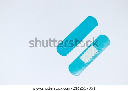 Blue adhesive bandage plasters on white background,Medical Equipment
