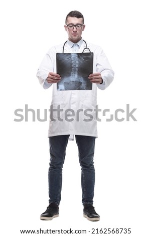 doctor with an x-ray in his hands. isolated on a white Royalty-Free Stock Photo #2162568735
