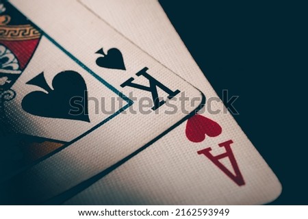 Two cards king of spades and ace of hearts. Ace and king poker cards. Nuts hand to win. Luck in the game of blackjack. High quality photo Royalty-Free Stock Photo #2162593949