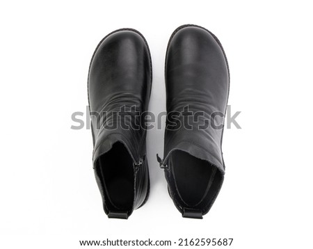 black leather jodhpur boots isolated on white background. Top view. Fashion shoes. Photoshoot for shoe shop concept