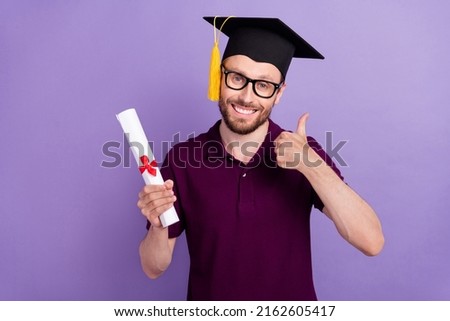 Photo of young man show thumb-up advertise recommend rate university isolated over violet color background
