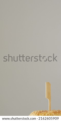 Vertical image of fresh homemade hamburger with salad on wooden background. fresh homemade fast food.