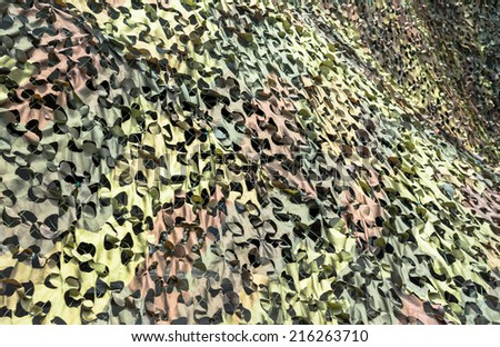 Texture military camouflage nets on day  time image.