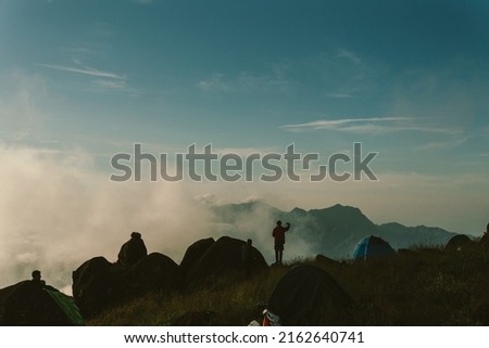 Nature of life, a natural elevation of the earth's surface rising more or less abruptly to a summit, and attaining an altitude greater than that of a hill Royalty-Free Stock Photo #2162640741