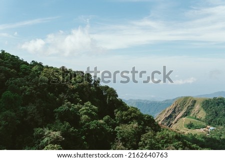 Nature of life, a natural elevation of the earth's surface rising more or less abruptly to a summit, and attaining an altitude greater than that of a hill Royalty-Free Stock Photo #2162640763