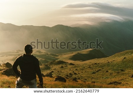 Nature of life, a natural elevation of the earth's surface rising more or less abruptly to a summit, and attaining an altitude greater than that of a hill Royalty-Free Stock Photo #2162640779
