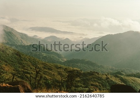 Nature of life, a natural elevation of the earth's surface rising more or less abruptly to a summit, and attaining an altitude greater than that of a hill Royalty-Free Stock Photo #2162640785