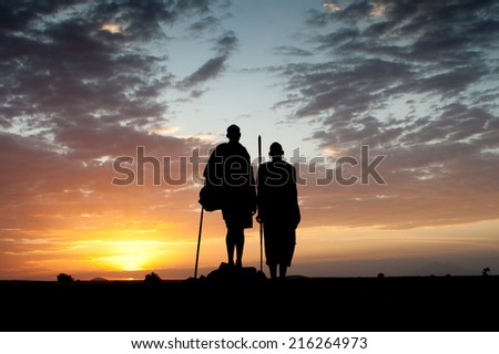 Masai and sunset Royalty-Free Stock Photo #216264973