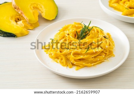 fettuccine spaghetti pasta with butternut pumpkin creamy sauce Royalty-Free Stock Photo #2162659907