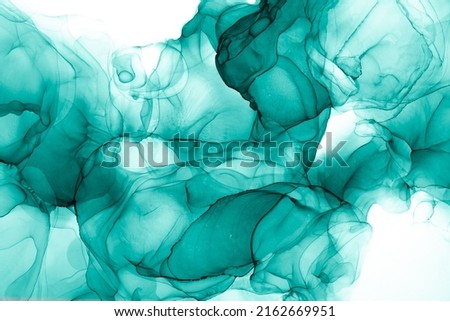 Marble ink abstract art from exquisite original painting for abstract background . Painting was painted on high quality paper texture to create smooth marble background pattern of ombre alcohol ink . Royalty-Free Stock Photo #2162669951