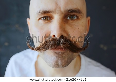 hipster man long mustache style face vintage barbershop retro fashion Royalty-Free Stock Photo #2162677831