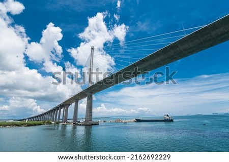 The impressive CCLEX bridge, a large cable-stayed bridge, part of the Cebu–Cordova Link Expressway. Royalty-Free Stock Photo #2162692229