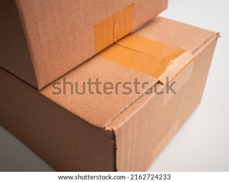 Close stack cardboard boxes isolated on white background