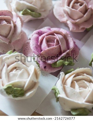 Homemade marshmallows in shape of rose flowers. Zephyr flowers.