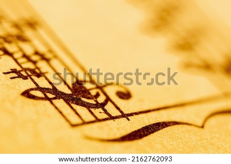 Close up treble clef and music notes. Selective focus. Copy space.