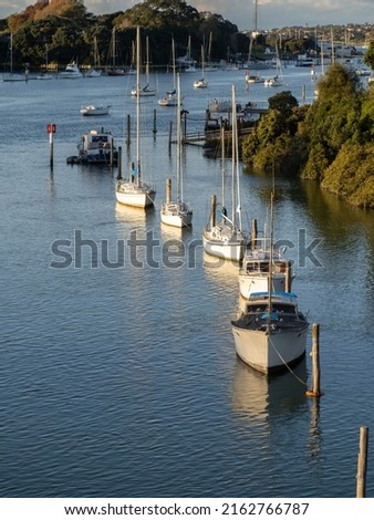 Aerial view of Tamaki river (Auckland, New Zealand) with moored boats. Stock photo.